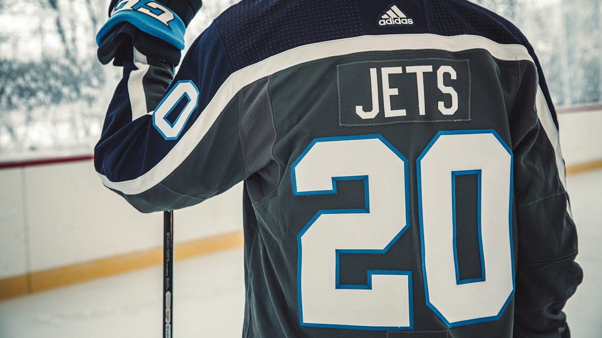 Connor Hellebuyck Winnipeg Jets Signed Reverse Retro Adidas Jersey