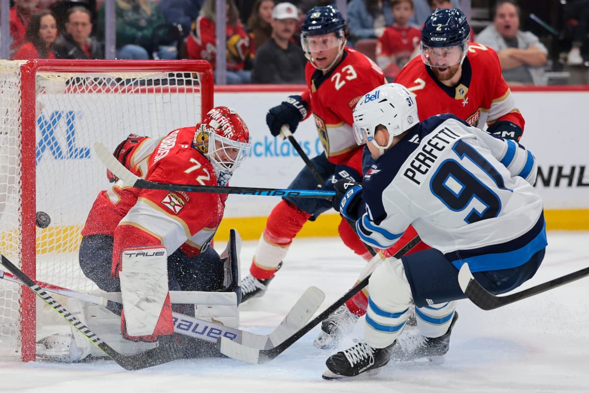Comrie makes 27 saves as Jets edge Panthers 2-1